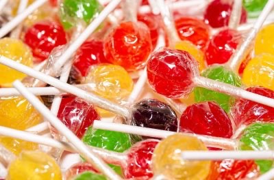 If you put a candy in your mouth and then realized you forgot to make a bracha, what should you do?