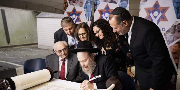 Yachad Celebrates Its First Sefer Torah